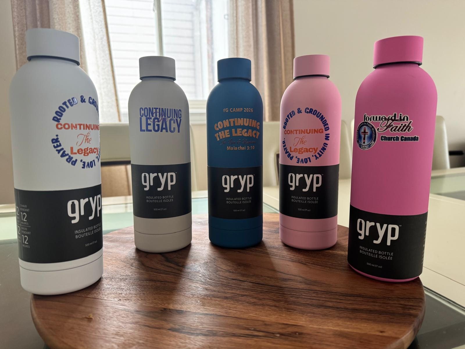 Faith and event water bottles in white, blue and pink